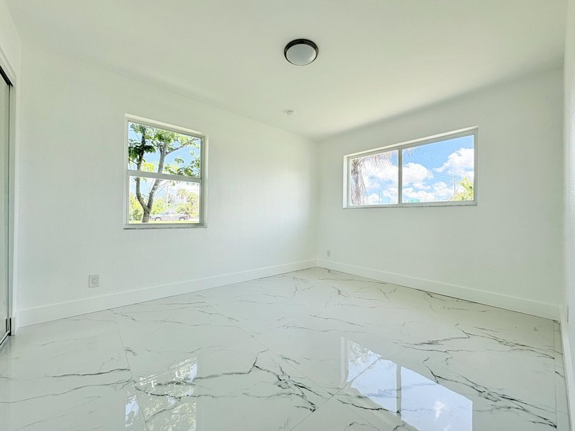 Charming 4-bedroom, 2-bath home on septic in desirable Palm - photo 24