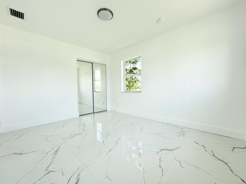 Charming 4-bedroom, 2-bath home on septic in desirable Palm - photo 25