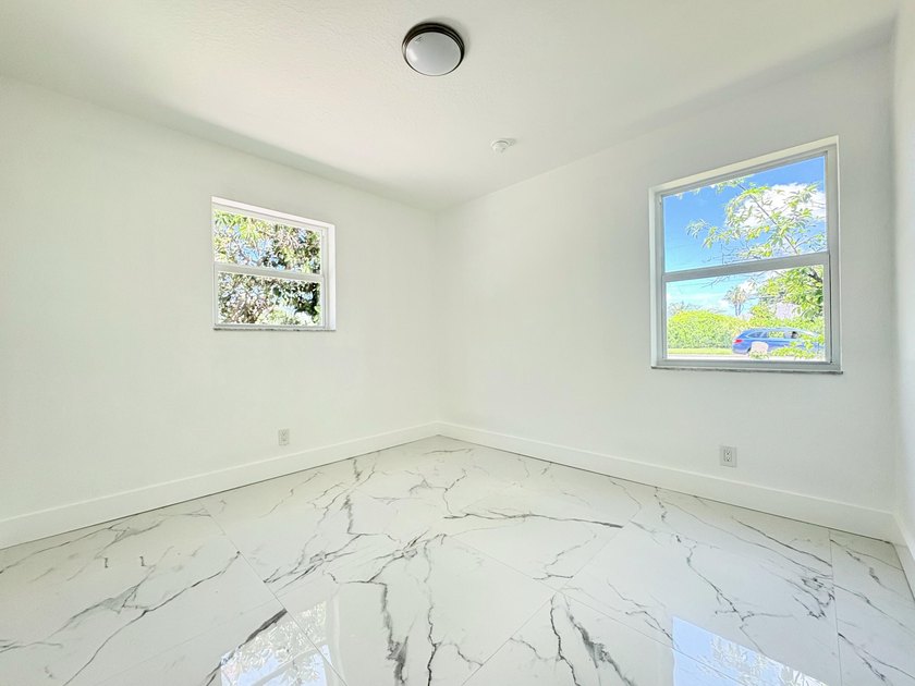 Charming 4-bedroom, 2-bath home on septic in desirable Palm - photo 26