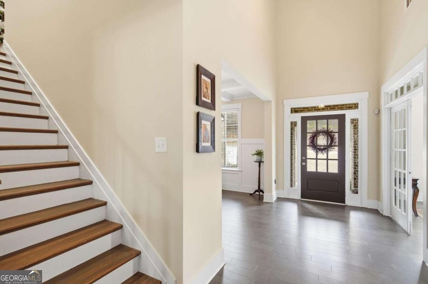 Owner's suite on the main, flexible main-level guest/office - photo 3