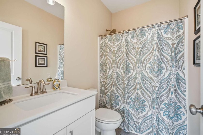 Owner's suite on the main, flexible main-level guest/office - photo 6
