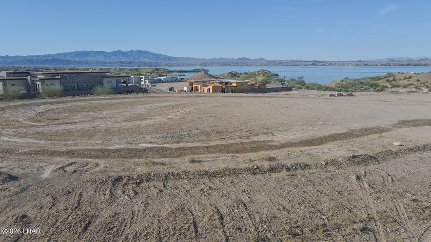 Welcome to lot 14 at The Coves at Sailing Hawks. With this - photo 2