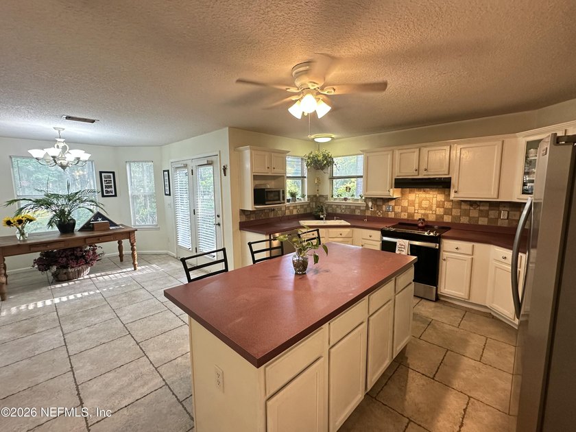 Spacious 3-bedroom, 2.5-bath home situated on over 1.5 acres of - photo 8