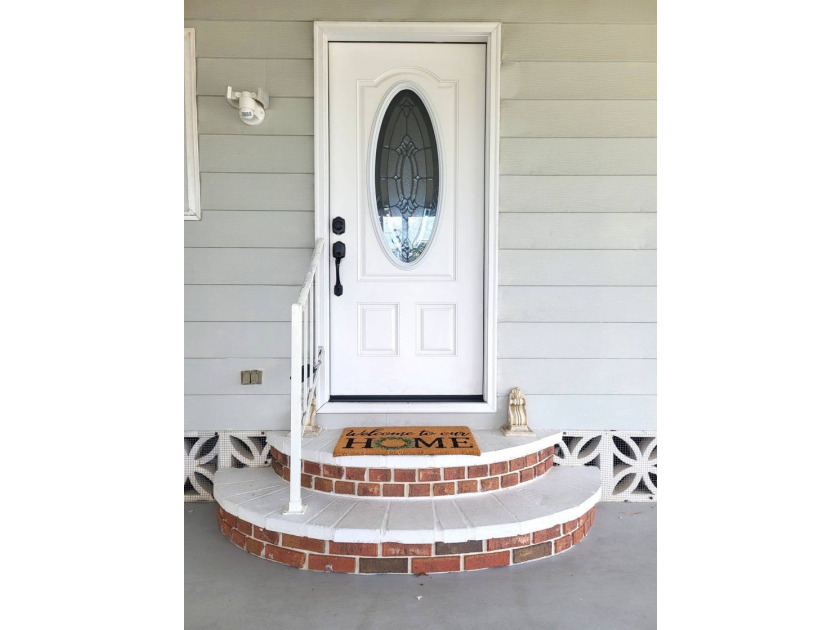 BEAUTIFUL RENOVATION IS TURNKEY AND INCLUDES GOLF CART! Just - photo 10