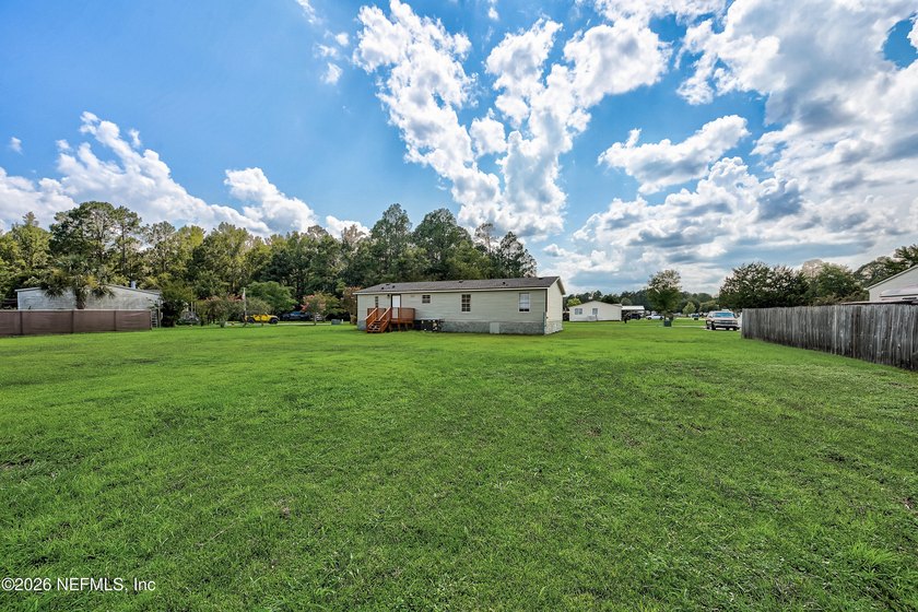 Welcome home to peaceful country living! Nestled on 1 beautiful - photo 22