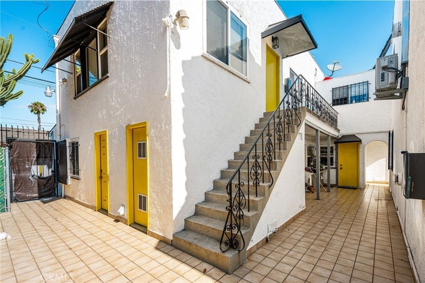 Prime mixed-use property for sale in Long Beach! This versatile - photo 10