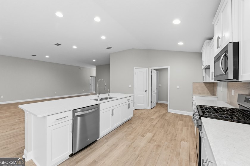 Welcome to this beautiful 4-bedroom, 3-bath home located in a - photo 19