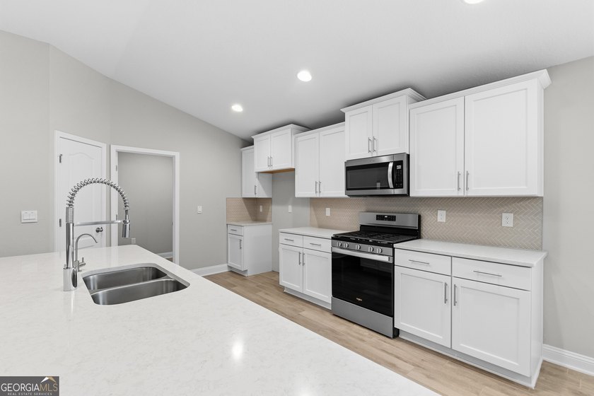 Welcome to this beautiful 4-bedroom, 3-bath home located in a - photo 20