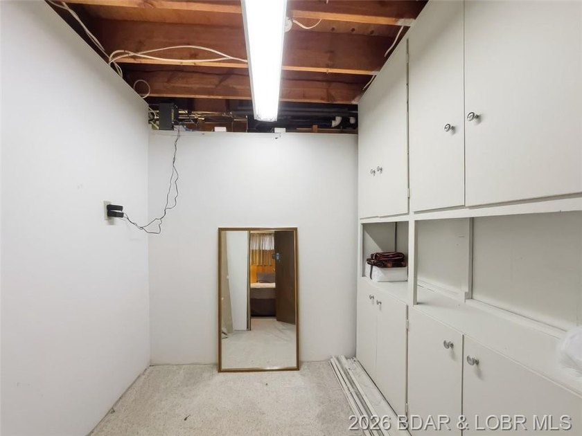 Updated Lake Front Home with Cove protection and Main Channel - photo 26