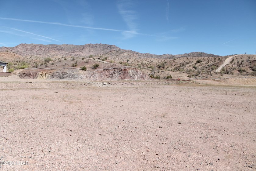 Beautiful Huge lot located at the end of a cul-de-sac in a gated - photo 2