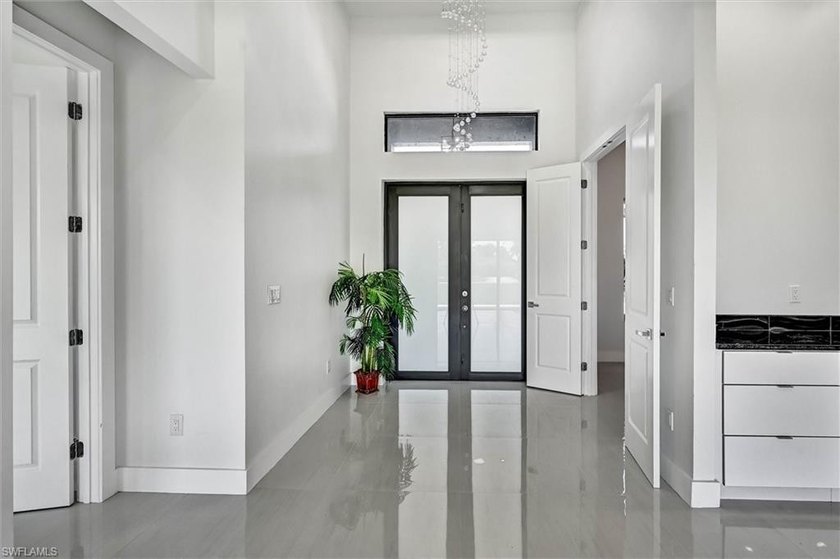 Step inside this immaculate 2023-built home and you will be - photo 11
