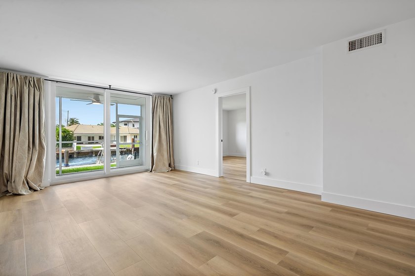 Welcome to Unit 109 at Boca House - a stunning, fully renovated - photo 11