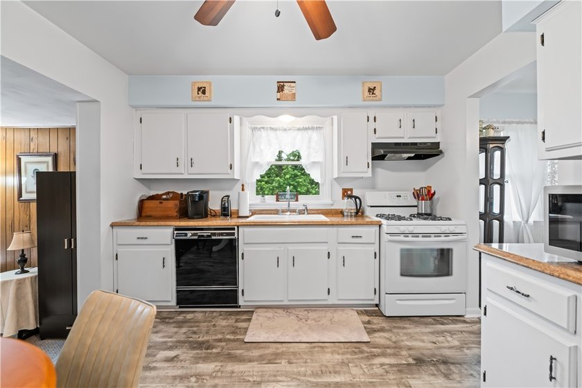 Welcome home to this spacious 4-bedroom, 1.5-bath home in Chili! - photo 15