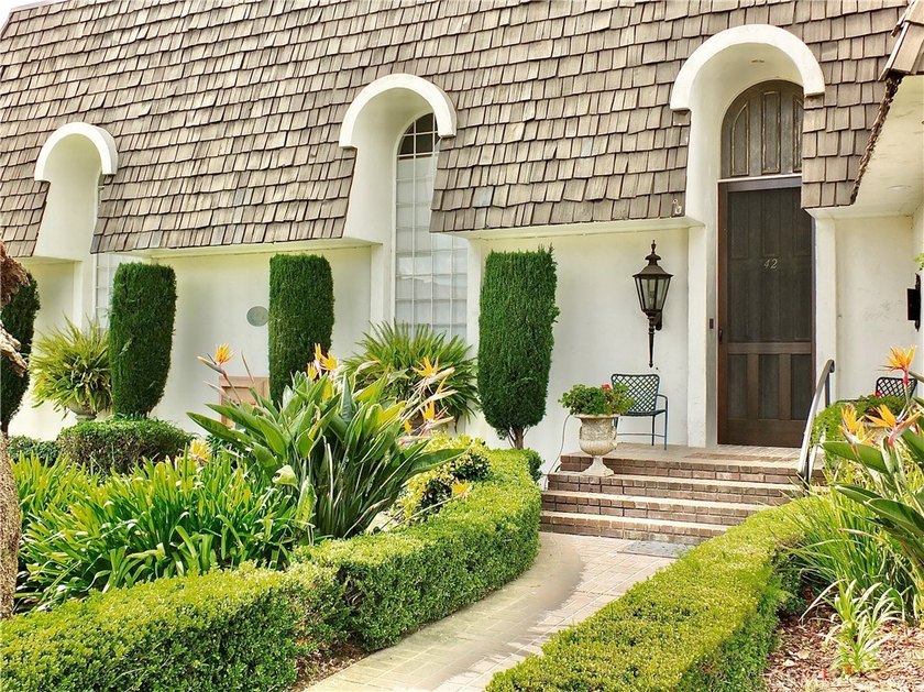 One of only 33 custom built homes behind the exclusive gates of - photo 2