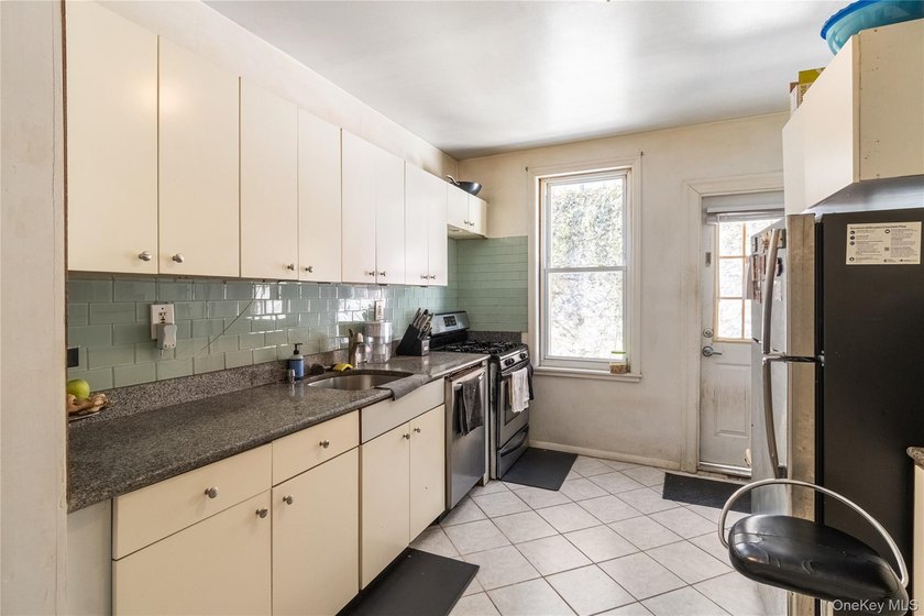 Beautiful and unique oversized brick 3 family home. Great - photo 26