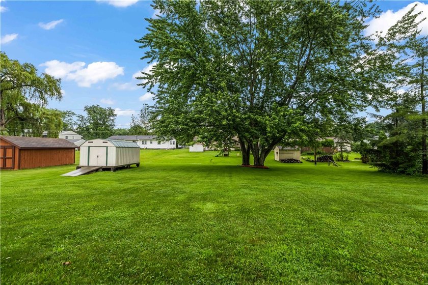 Welcome home to this spacious 4-bedroom, 1.5-bath home in Chili! - photo 32