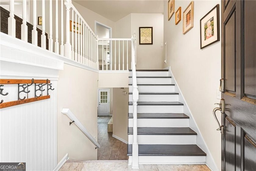 Step into this beautifully refreshed split-level home, ready and - photo 2