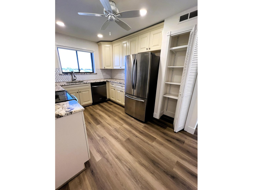 Welcome to this charming 2-bedroom, 2-bathroom condo on the - photo 8