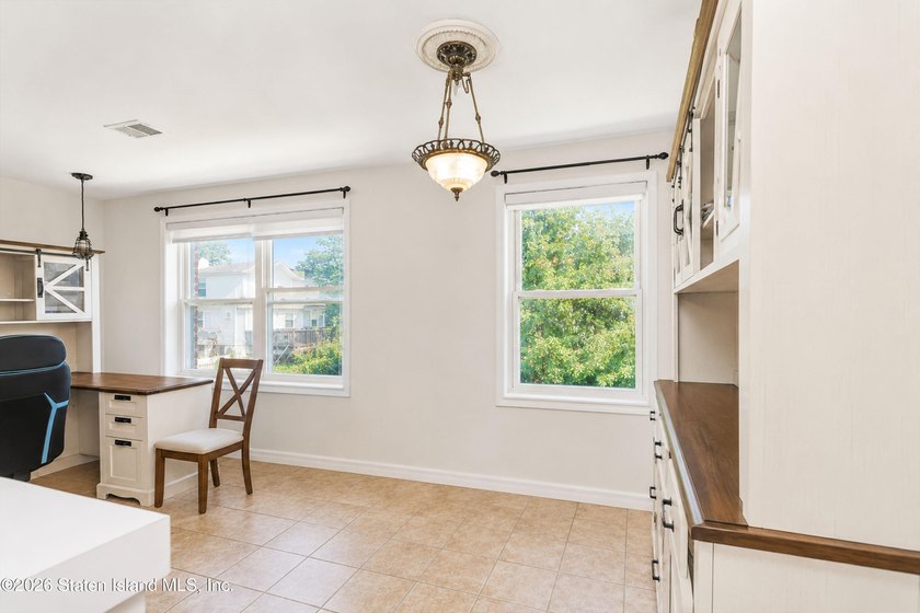Welcome to this bright and beautifully updated second-floor - photo 11