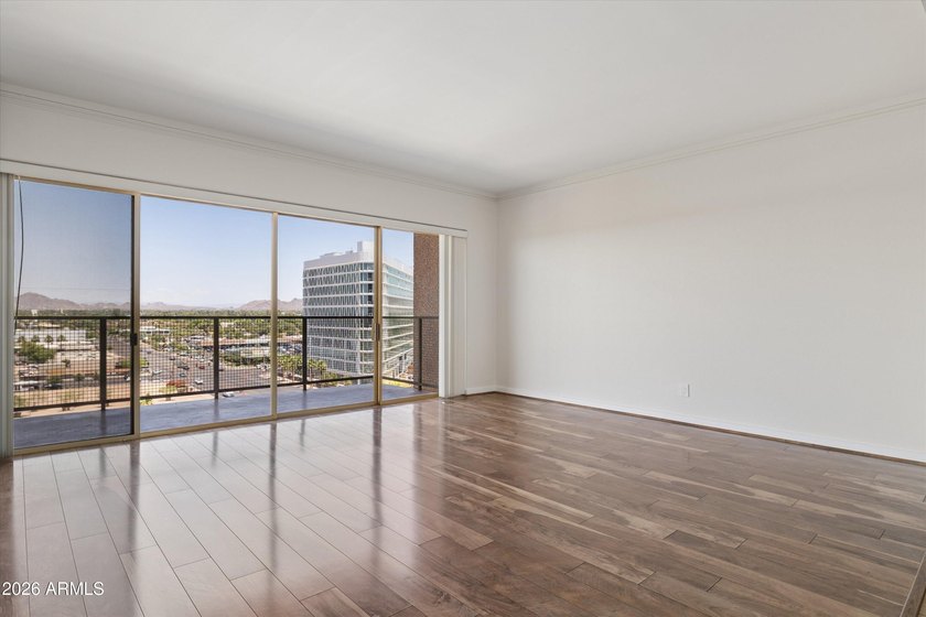 Elevated 9th floor living awaits in this updated end unit. Enjoy - photo 3