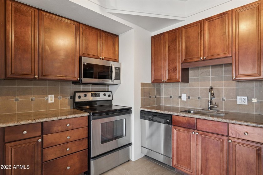 Elevated 9th floor living awaits in this updated end unit. Enjoy - photo 10