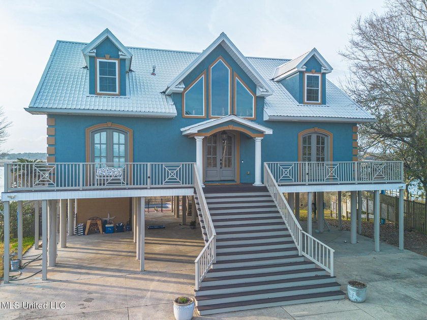 Introducing a rare riverfront retreat in the sought-after - photo 4
