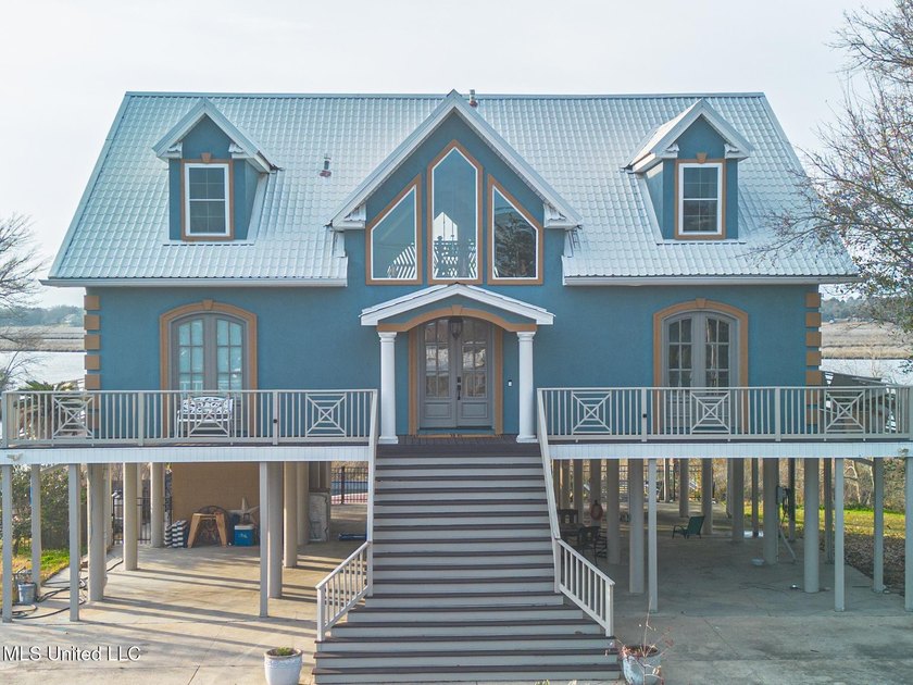 Introducing a rare riverfront retreat in the sought-after - photo 5