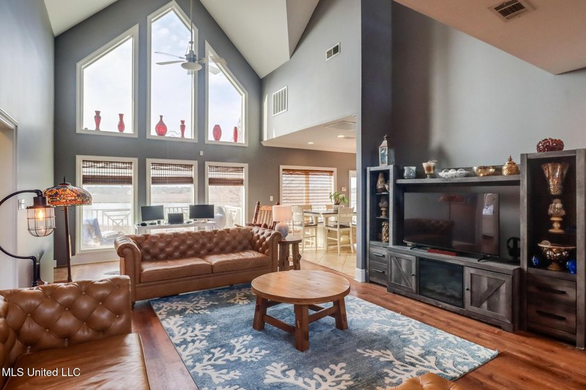 Introducing a rare riverfront retreat in the sought-after - photo 7