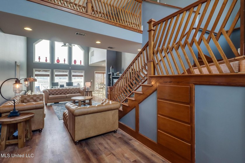 Introducing a rare riverfront retreat in the sought-after - photo 8