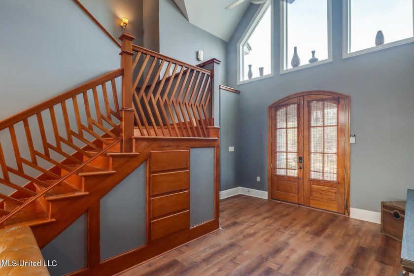 Introducing a rare riverfront retreat in the sought-after - photo 9