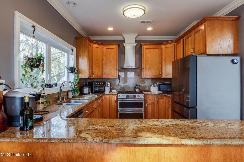 Introducing a rare riverfront retreat in the sought-after - photo 10