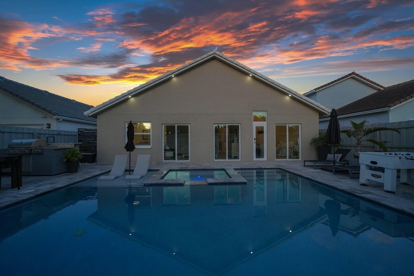 Welcome to this stunning 4-bedroom, 2-bathroom residence - photo 7