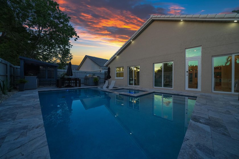 Welcome to this stunning 4-bedroom, 2-bathroom residence - photo 8