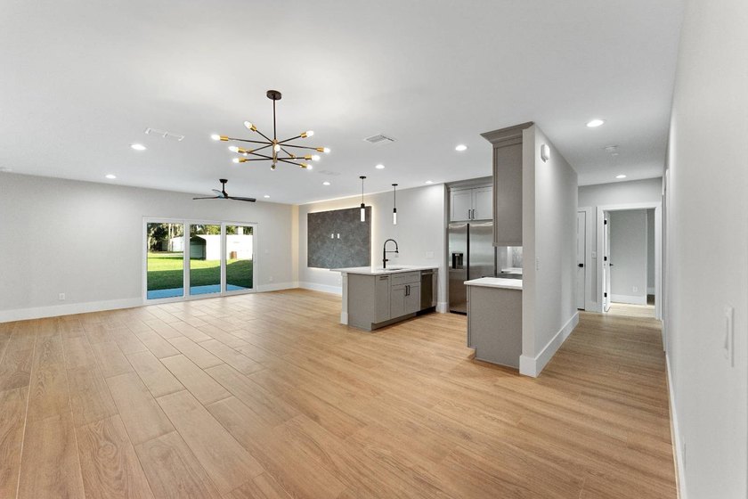 Life at 455 Riverview Avenue begins beneath the quiet canopy of - photo 11