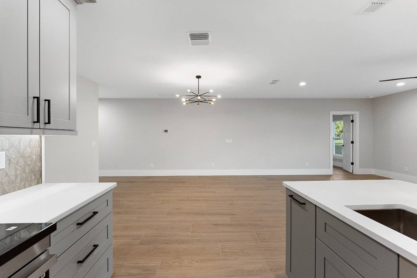 Life at 455 Riverview Avenue begins beneath the quiet canopy of - photo 16