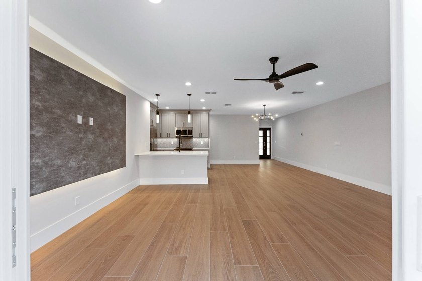 Life at 455 Riverview Avenue begins beneath the quiet canopy of - photo 18