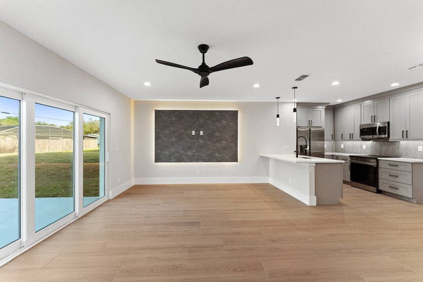 Life at 455 Riverview Avenue begins beneath the quiet canopy of - photo 20