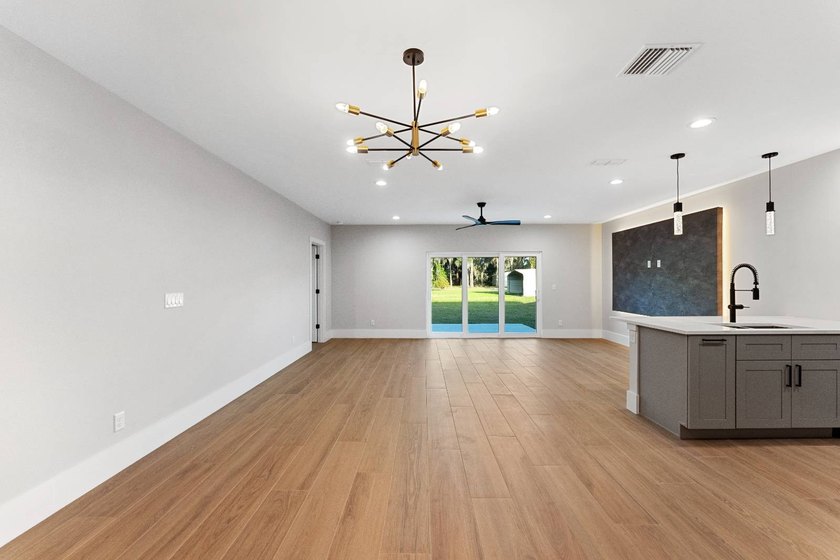 Life at 455 Riverview Avenue begins beneath the quiet canopy of - photo 21