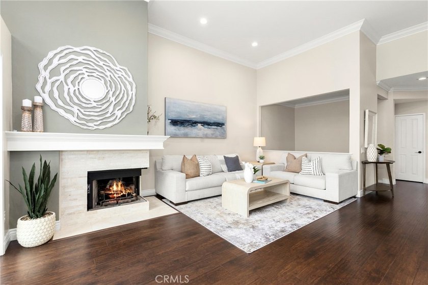 Rarely available end-unit 3-bedroom, 3 full-bath home in the - photo 2