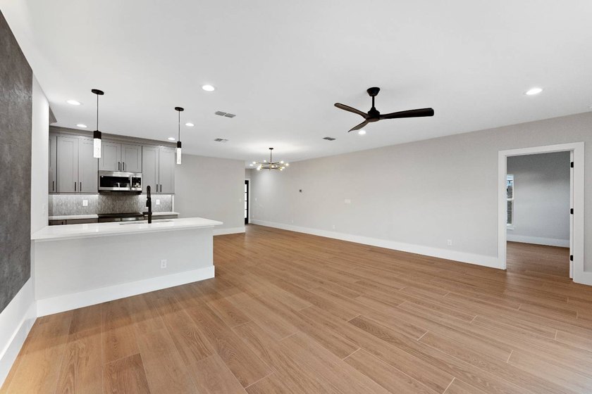 Life at 455 Riverview Avenue begins beneath the quiet canopy of - photo 22