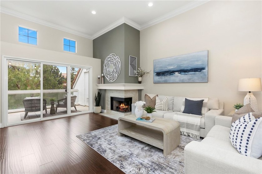 Rarely available end-unit 3-bedroom, 3 full-bath home in the - photo 3