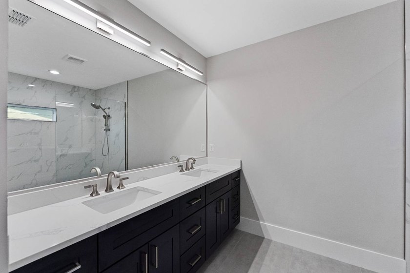 Life at 455 Riverview Avenue begins beneath the quiet canopy of - photo 29
