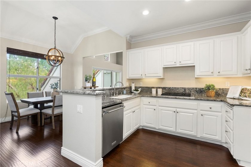 Rarely available end-unit 3-bedroom, 3 full-bath home in the - photo 10
