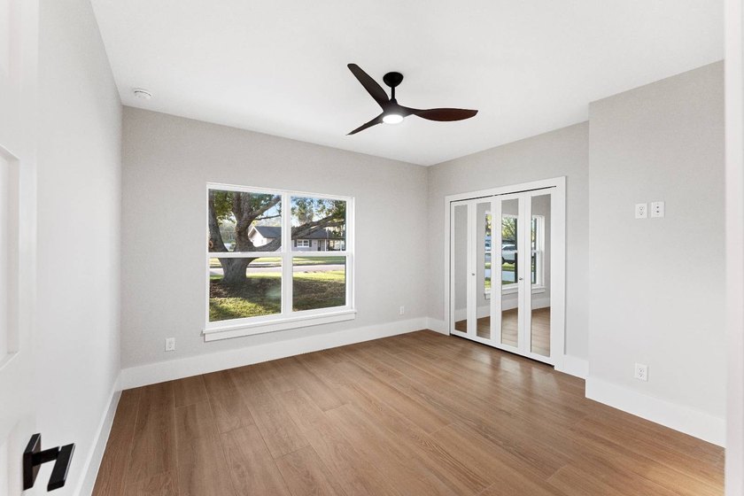 Life at 455 Riverview Avenue begins beneath the quiet canopy of - photo 33