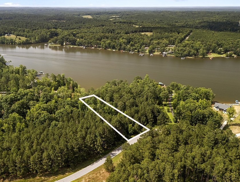Welcome to Eagles Harbor, a private gated lake community where - photo 5