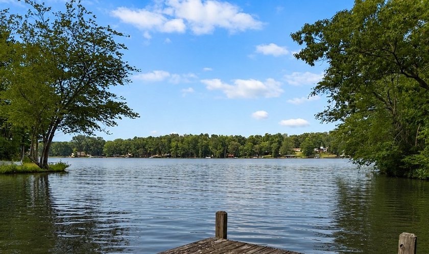 Welcome to Eagles Harbor, a private gated lake community where - photo 6