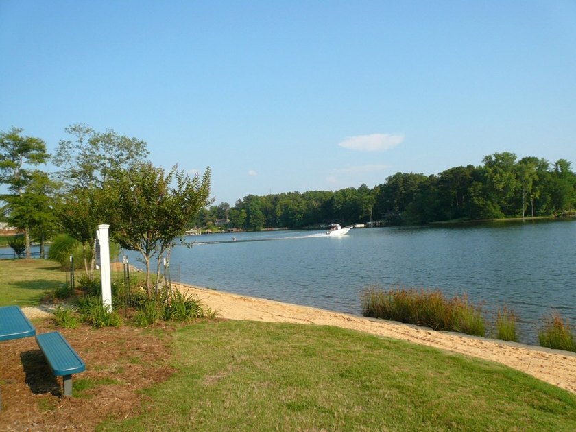 Welcome to Eagles Harbor, a private gated lake community where - photo 8
