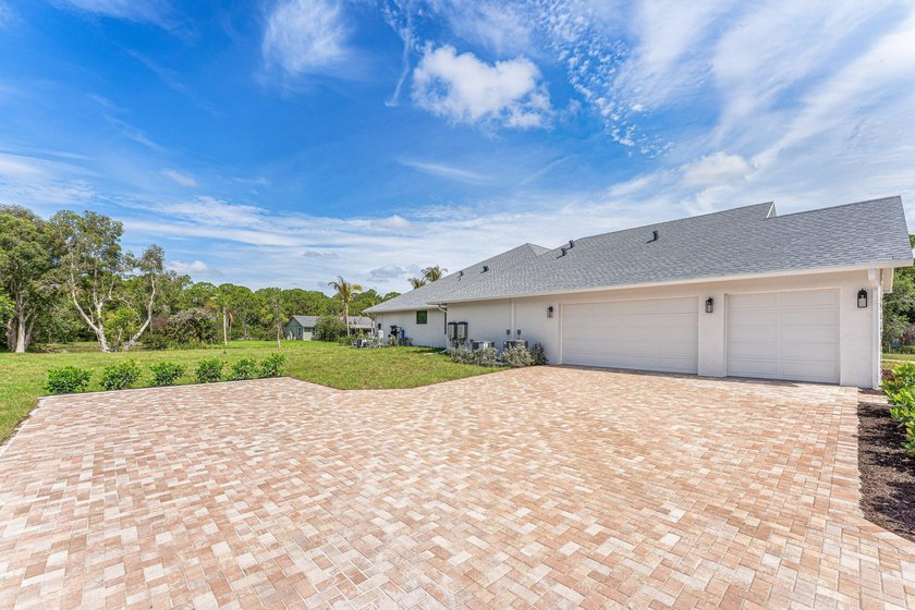 Welcome to 16631 132nd Terrace North, a newly completed custom - photo 7