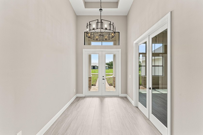 Welcome to 16631 132nd Terrace North, a newly completed custom - photo 8
