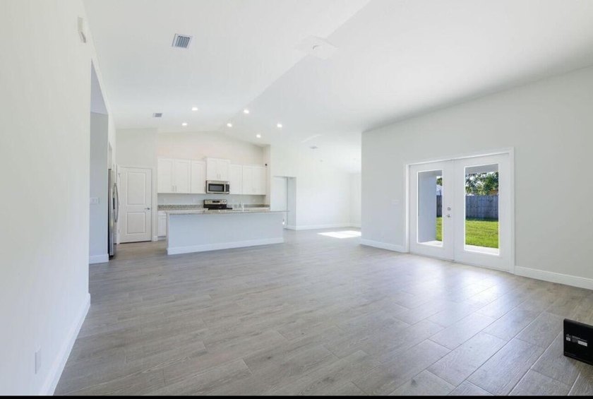 Beautiful 2022 CBS home featuring 4 bedrooms, 2 bathrooms, and a - photo 2